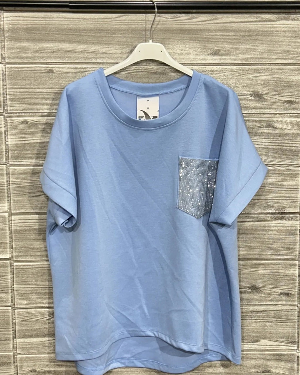 BLUSA MC BOLSILLO LT